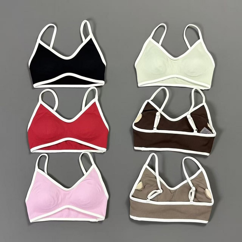 Yoga Daily Fitness - Damski biustonosz sportowy z kontrastowymi liniami,