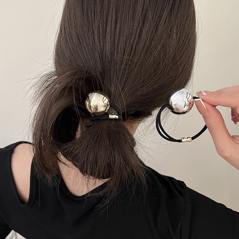 Metalowa gumka do włosów z met – Shoulder Massage Ball recenzja i cena